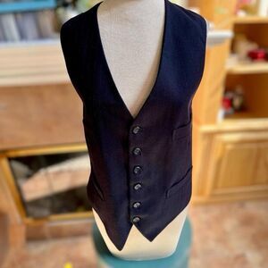 Men's vintage vest size Med. Purchased from a wardrobe set.